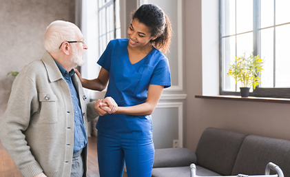 carer helping a patient