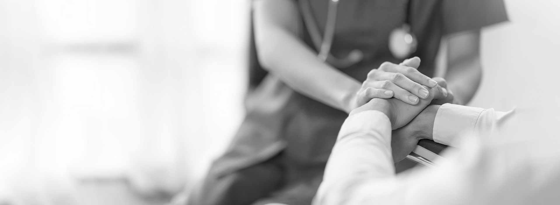 carer holding hands